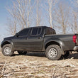 Load image into Gallery viewer, Rough Country 2.5 Inch Leveling Kit | Red Spacers | Nissan Frontier (05-24)/Xterra (05-15) 865RED - Front View