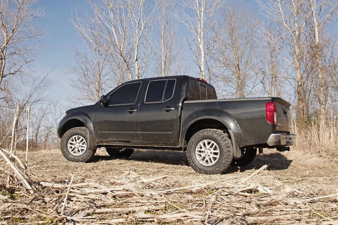 Rough Country 2.5 Inch Leveling Kit | Red Spacers | Nissan Frontier (05-24)/Xterra (05-15) 865RED - Front View