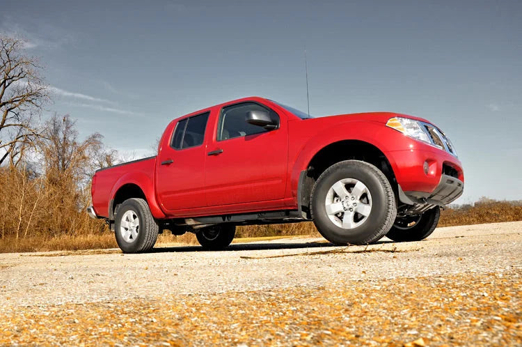 Rough Country 2.5 Inch Leveling Kit | Red Spacers | Nissan Frontier (05-24)/Xterra (05-15) 865RED - Installation View