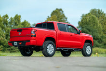 Load image into Gallery viewer, Rough Country 2.5 Inch Leveling Kit | Red Spacers | Nissan Frontier (05-24)/Xterra (05-15) 867RED - Front View