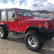 Load image into Gallery viewer, Rough Country 2.5 Inch Lift Kit | V2 | Jeep Wrangler YJ 4WD (1987-1995) 61570 - Side View