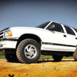 Load image into Gallery viewer, Rough Country 2.5 Inch Lift Kit | Chevy/GMC Blazer/S10 Truck/S15 Jimmy 4WD 24230 - Installation View