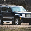 Load image into Gallery viewer, Rough Country 2.5 Inch Lift Kit | Jeep Liberty KK 4WD (2008-2012) 687 - Side View