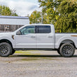 Load image into Gallery viewer, Rough Country 2.5 Inch Lift Kit | M1 Struts | Ford F-150 Tremor 4WD (2021-2024) 510040 - Installation View