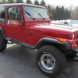 Load image into Gallery viewer, Rough Country 2.5 Inch Lift Kit | V2 | Jeep Wrangler YJ 4WD (1987-1995) 61570 - Detail View