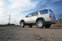 Load image into Gallery viewer, Rough Country 3 Inch Lift Kit | M1 Struts/M1 | Toyota 4Runner 2WD/4WD (1996-2002) 77140 - Installation View