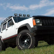 Load image into Gallery viewer, Rough Country 3 Inch Lift Kit | Rear AAL | Jeep Cherokee XJ 2WD/4WD (1984-2001) 670N2 - Installation View