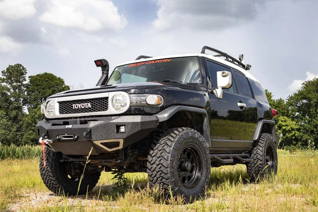 Rough Country 3 Inch Lift Kit | Red Spacers | Toyota 4Runner (03-09)/FJ Cruiser (07-14) 76530RED - Side View