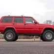 Load image into Gallery viewer, Rough Country 3 Inch Lift Kit | Series II | RR Springs | M1 | Jeep Cherokee XJ (84-01) 63041 - Installation View