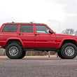Load image into Gallery viewer, Rough Country 3 Inch Lift Kit | Series II | RR Springs | V2 | Jeep Cherokee XJ (84-01) 630X70 - Installation View