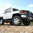 Load image into Gallery viewer, Rough Country 3 Inch Lift Kit | Toyota 4Runner (03-09)/FJ Cruiser (07-14) 2WD/4WD 76530 - Installation View
