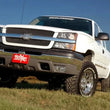 Load image into Gallery viewer, Rough Country 4 Inch Lift Kit | Chevy Silverado &amp; GMC Sierra 1500 4WD (1999-2006 &amp; Classic) 25830 - Installation View