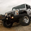 Load image into Gallery viewer, Rough Country 4 Inch Lift Kit | V2 | Jeep Wrangler Unlimited 2WD/4WD (2007-2018) 68170 - Installation View