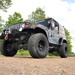 Load image into Gallery viewer, Rough Country 4 Inch Lift Kit | Jeep Wrangler TJ (03-06)/Wrangler Unlimited (04-06) 90730 - Installation View