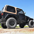 Load image into Gallery viewer, Rough Country 4 Inch Lift Kit | Jeep Wrangler TJ (03-06)/Wrangler Unlimited (04-06) 90730 - Installation View