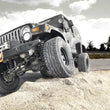 Load image into Gallery viewer, Rough Country 4 Inch Lift Kit | Jeep Wrangler TJ 4WD (1997-2002) 90630 - Installation View