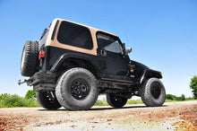 Load image into Gallery viewer, Rough Country 4 Inch Lift Kit | Jeep Wrangler TJ 4WD (1997-2002) 90630 - Installation View