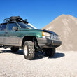 Load image into Gallery viewer, Rough Country 4 Inch Lift Kit | Long Arm | Jeep Grand Cherokee ZJ 4WD (1993-1998) 90222 - Installation View