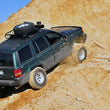 Load image into Gallery viewer, Rough Country 4 Inch Lift Kit | Long Arm | Jeep Grand Cherokee ZJ 4WD (1993-1998) 90222 - Installation View