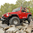 Load image into Gallery viewer, Rough Country 4 Inch Lift Kit | Long Arm | V2 | Jeep Wrangler TJ 4WD (1997-2006) - Back View
