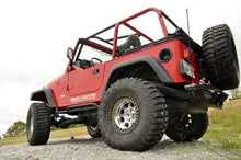 Load image into Gallery viewer, Rough Country 4 Inch Lift Kit | Long Arm | V2 | Jeep Wrangler TJ 4WD (1997-2006) - Installation View