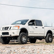 Load image into Gallery viewer, Rough Country 4 Inch Lift Kit | Nissan Titan 2WD/4WD (2004-2015) 874.20 - Installation View