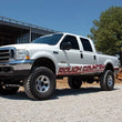 Load image into Gallery viewer, Rough Country 4 Inch Lift Kit | Rear Blocks | V2 | Ford F-250/F-350 Super Duty 4WD (1999) 49470 - Installation View