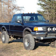 Load image into Gallery viewer, Rough Country 4 Inch Lift Kit | Rear Springs | Ford Ranger 4WD (1983-1997) 48030 - Installation View