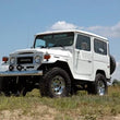 Load image into Gallery viewer, Rough Country 4 Inch Lift Kit | Toyota Land Cruiser FJ40 4WD (1964-1980) 73530 - Installation View