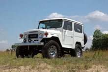 Load image into Gallery viewer, Rough Country 4 Inch Lift Kit | Toyota Land Cruiser FJ40 4WD (1964-1980) 73530 - Installation View
