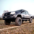 Load image into Gallery viewer, Rough Country 4 Inch Lift Kit | Toyota Tacoma 2WD/4WD (2005-2015) 746.20 - Installation View