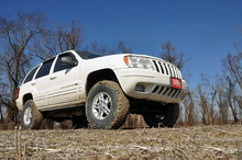Load image into Gallery viewer, Rough Country 4 Inch Lift Kit | X-Series | Jeep Grand Cherokee WJ 2WD/4WD (1999-2004) 639P - Installation View