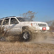 Load image into Gallery viewer, Rough Country 4 Inch Lift Kit | X-Series | Jeep Grand Cherokee WJ 2WD/4WD (1999-2004) 639P - Installation View