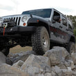 Load image into Gallery viewer, Rough Country 4 Inch Lift Kit | X-Series | M1R | Jeep Wrangler JK 4WD (2007-2018) - Installation View