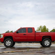 Load image into Gallery viewer, Rough Country 5 Inch Lift Kit | Chevy Silverado &amp; GMC Sierra 1500 2WD (2007-2013) 10830 - Back View