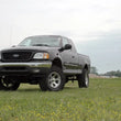 Load image into Gallery viewer, Rough Country 5 Inch Lift Kit | Ford F-150 4WD (1997-2003) 476.20 - Installation View