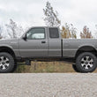 Load image into Gallery viewer, Rough Country 5 Inch Lift Kit | Multiple Makes &amp; Models (Ford/Mazda) 43130 - Back View