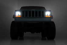 Load image into Gallery viewer, Rough Country 5"x7" LED Headlights | DOT Approved | Jeep Cherokee XJ 2WD/4WD (1984-2001) RCH5200 - Installation View