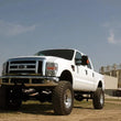 Load image into Gallery viewer, Rough Country 6 Inch Lift Kit | Gas | 4 Link | M1 | Ford F-250/F-350 Super Duty 4WD (08-10) 58840 - Installation View