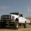 Load image into Gallery viewer, Rough Country 6 Inch Lift Kit | Gas | 4 Link | M1 | Ford F-250/F-350 Super Duty 4WD (08-10) 58840 - Installation View