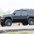 Load image into Gallery viewer, Rough Country 6 Inch Lift Kit | NTD | Chevy/GMC Tahoe/Yukon 2WD/4WD (2000-2006) 28020 - Installation View