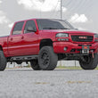 Load image into Gallery viewer, Rough Country 6 Inch Lift Kit | NTD | M1 | Chevy/GMC 1500 4WD (99-06 &amp; Classic) 27240 - Back View