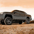Load image into Gallery viewer, Rough Country 6 Inch Lift Kit | NTD | M1 | GMC Yukon XL 1500 2WD/4WD (2000-2006) 27940 - Installation View