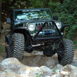 Load image into Gallery viewer, Rough Country 6 Inch Lift Kit | X-Series | M1 | Jeep Wrangler TJ (97-06)/Wrangler Unlimited (04-06) - Installation View