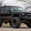 Load image into Gallery viewer, Rough Country 6.5 Inch Lift Kit | Long Arm | NP231 | Jeep Cherokee XJ 4WD (1984-2001) 67222 - Side View