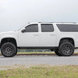 Load image into Gallery viewer, Rough Country 7 Inch Lift Kit | Chevy/GMC SUV 1500 2WD/4WD (2007-2014) 28700A - Installation View