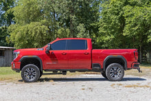 Load image into Gallery viewer, Rough Country 7 Inch Lift Kit | Torsion Drop | w/ Overloads | Chevy/GMC 2500HD/3500HD (20-26) - Installation View
