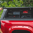 Load image into Gallery viewer, Rough Country Bed Cap Side Shelf Storage Bin | Passengers Side | Toyota Tacoma (16-26) 734075 - Installation View