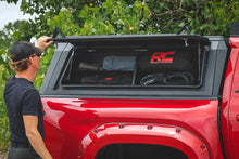 Load image into Gallery viewer, Rough Country Bed Cap Side Shelf Storage Bin | Passengers Side | Toyota Tacoma (16-26) 734075 - Installation View
