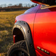 Load image into Gallery viewer, Rough Country Fender Flares | Defender | PS2 Bright Silver | Ram 1500 2WD/4WD (2019-2024) A-D10914-PS2 - Installation View